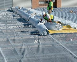 roofing crew installing a roof